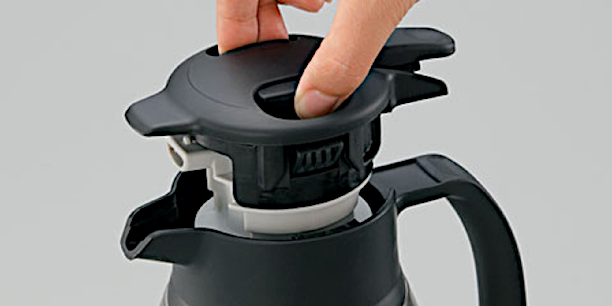 Zojirusho Thermal Carafe - Pinch-release stopper